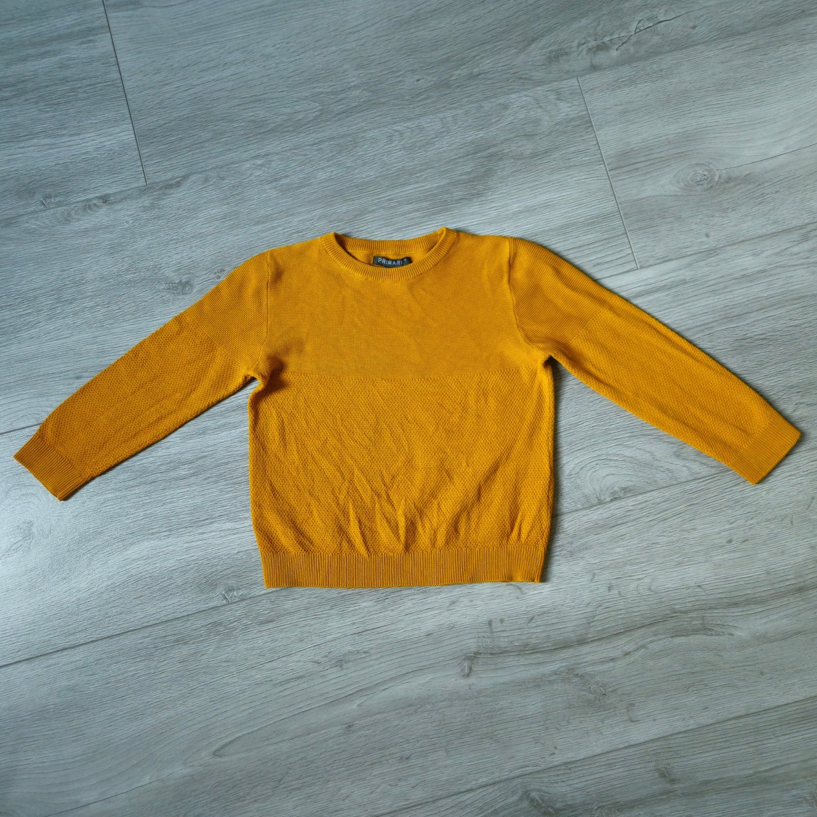 Kastopruiming: Okergele trui maat 116, Trui of Vest, Ophalen of Verzenden, Zo goed als nieuw, Primark