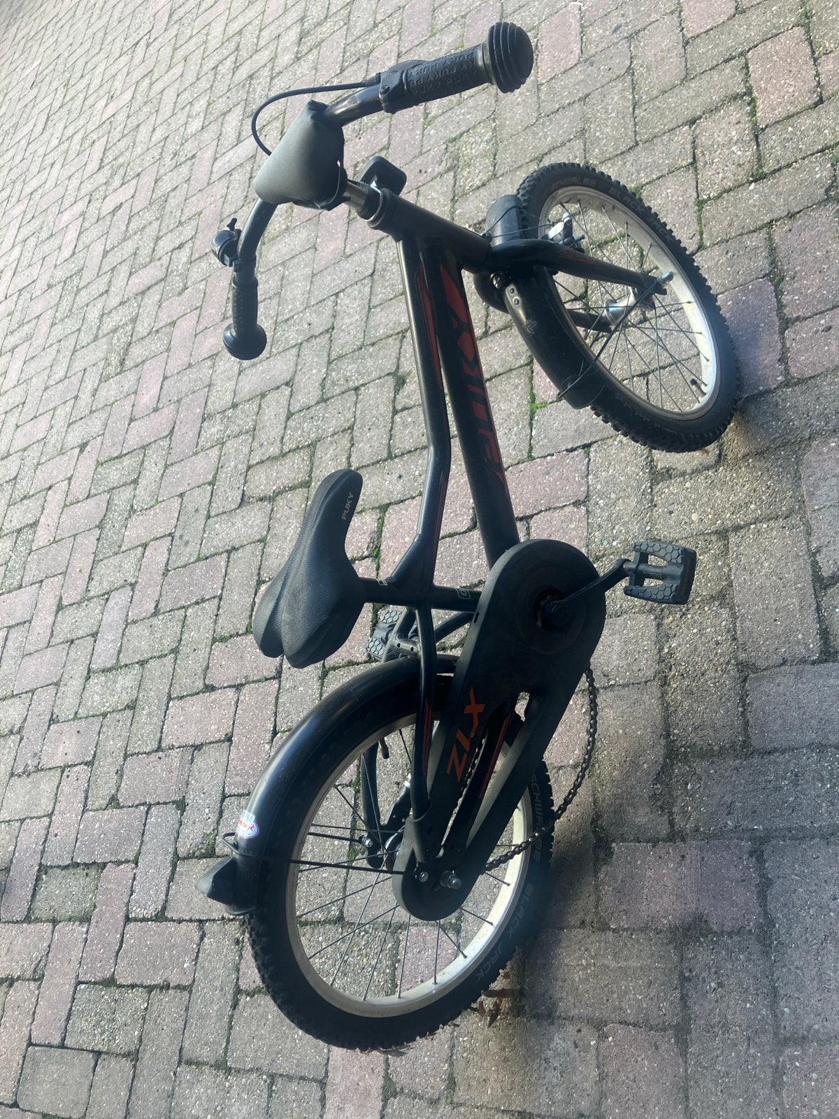 Puky kinderfiets - Zwart met rode accenten, Ophalen, Gebruikt, Terugtraprem, 16 tot 20 inch