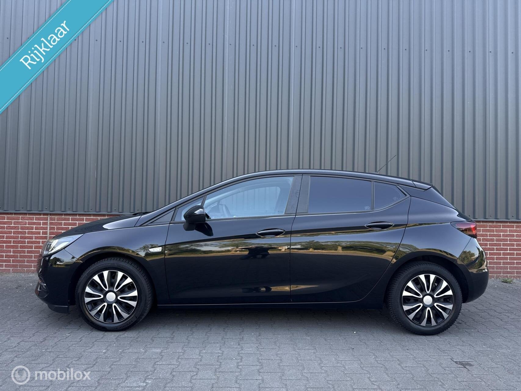 Opel Astra 1.2 Business Executive Cruise Led Carplay NL Auto, Voorwielaandrijving, Stof, Gebruikt, 1199 cc