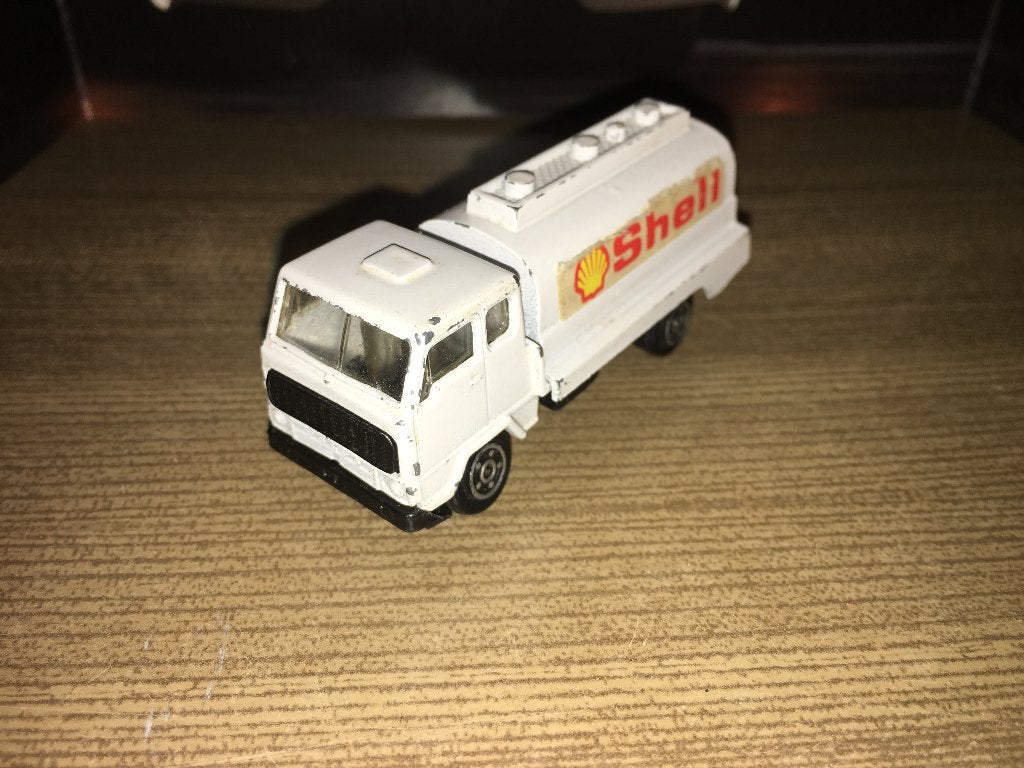 3x HO Volvo F88 Shell Norev + Guy Esso + MB Müller dieplader, Ophalen of Verzenden, Bus of Vrachtwagen, Corgi