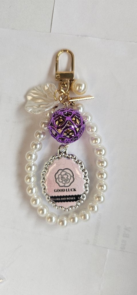 Sleutelhanger met parels en 'Good Luck' bedel, Ophalen of Verzenden, Nieuw, Overige typen