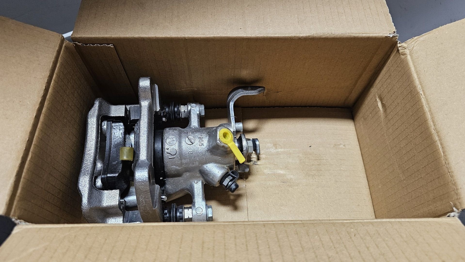 Remklauw links achter incl. remblokken  Mini R56 R55 R57 R58, -, -, Nieuw, Ophalen of Verzenden