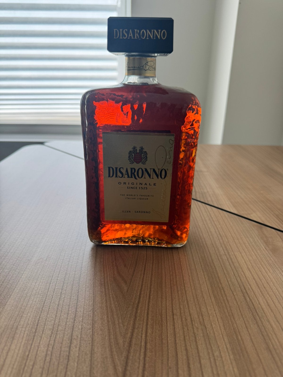 Fles Disaronno 100 cl, Ophalen of Verzenden, Zo goed als nieuw