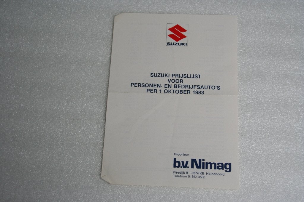 Folder Suzuki prijslijst (1-10-1983) (1), Ophalen of Verzenden, Gelezen, Overige merken