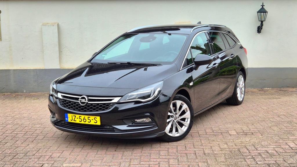 Opel Astra 1.4 Turbo 110KW SportsTourer+2016 Zwart/Inruil m, Auto's, Opel, Voorwielaandrijving, Zwart, 4 cilinders, Leder en Stof