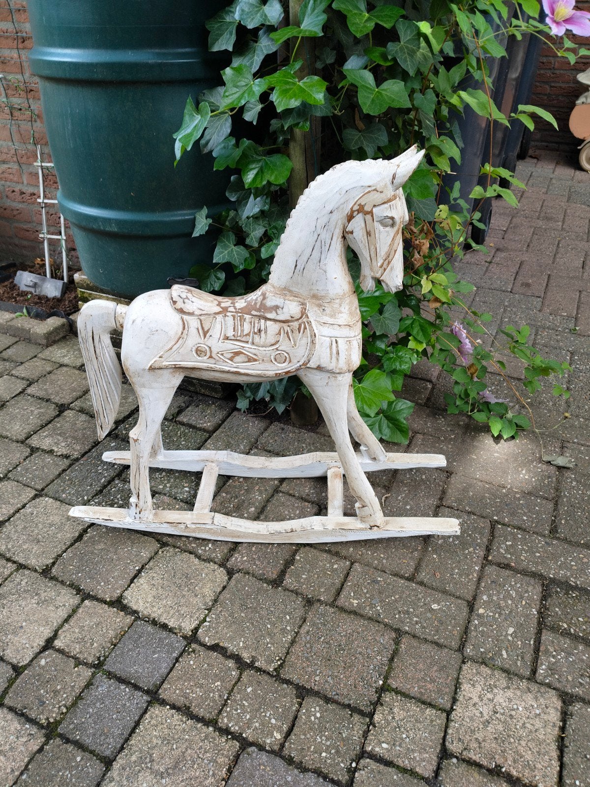 Antiek hobbelpaard, Ophalen