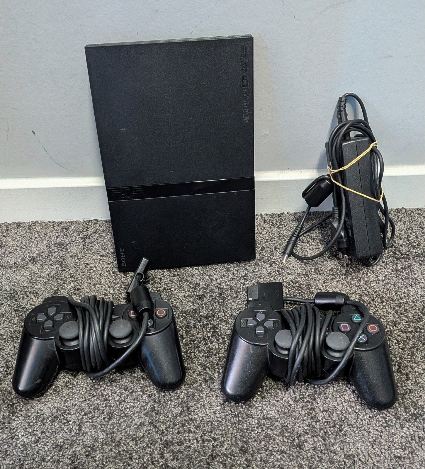 Sony PlayStation 2 Slim • Defect!, Spelcomputers en Games, Zwart, Met 2 controllers, Ophalen of Verzenden, Niet werkend