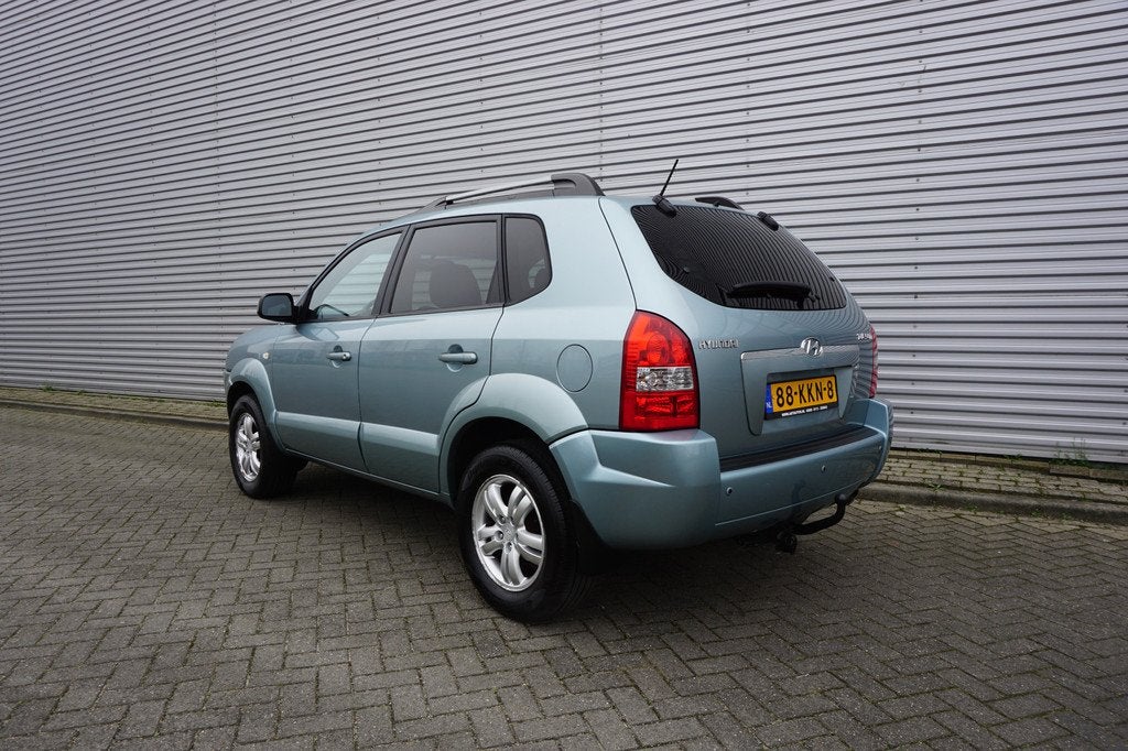 Hyundai Tucson 2.0i Style Executive Climate / Navi / Cruise, Auto's, Hyundai, Parkeersensor, Stof, Gebruikt, 4 cilinders