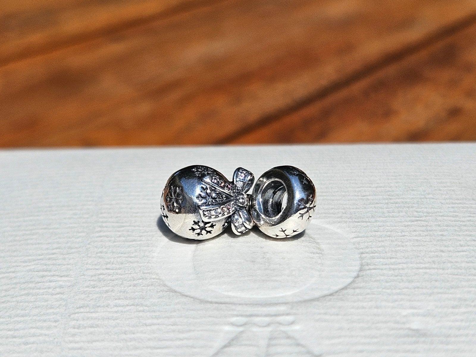 Pandora Kerstbedel Strik Sneeuwvlok Zilver, Pandora, Ophalen of Verzenden, Zo goed als nieuw, Zilver