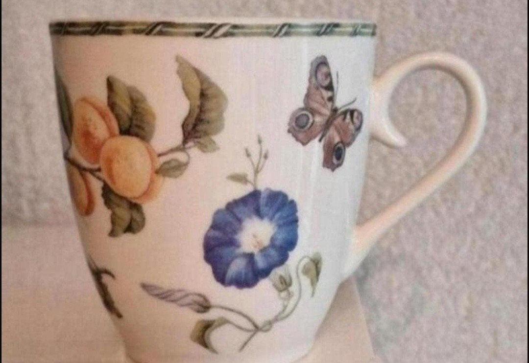 Beker Janneke Brinkman met opdruk Bloemen en Vlinders, Ophalen of Verzenden, Zo goed als nieuw, Overige stijlen, Kop(pen) en/of Schotel(s)