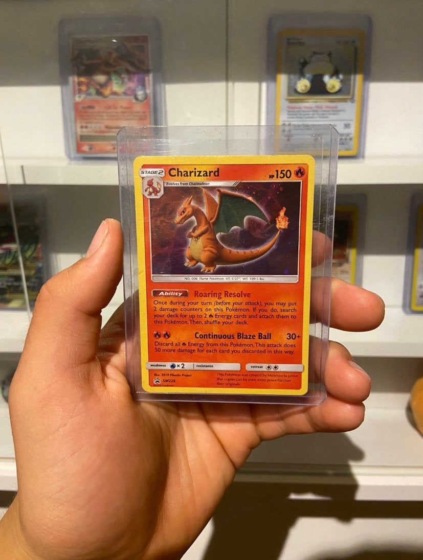 Charizard Holo SM226, Ophalen of Verzenden, Zo goed als nieuw