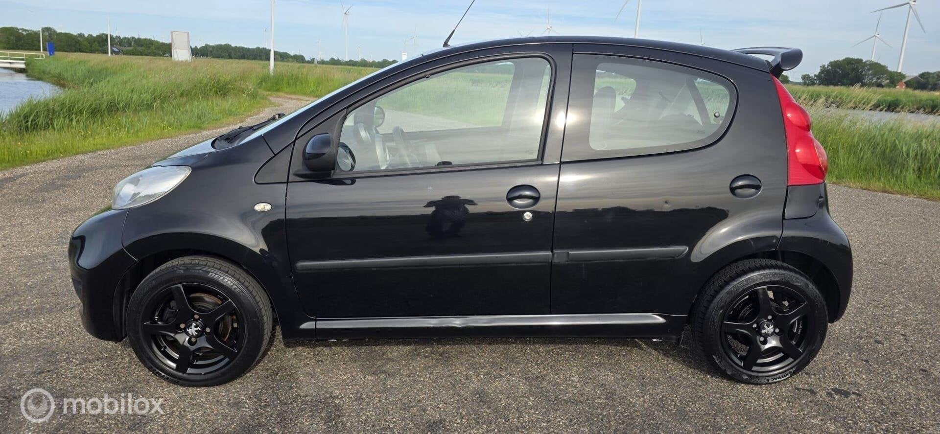 Peugeot 107 1.0-12V Sportium, Airco !, Voorwielaandrijving, Euro 5, Gebruikt, 4 stoelen