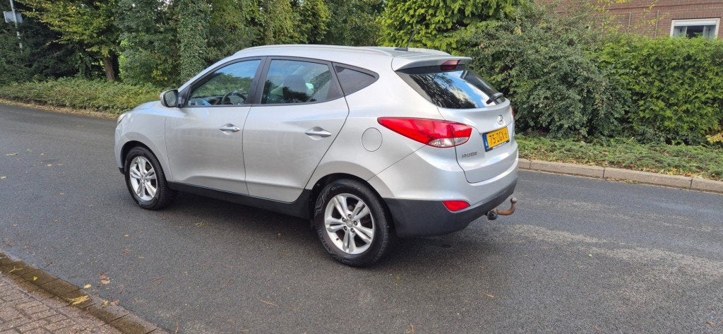 Hyundai IX35 2.0iBusiness Edition/automaat/leer/camera/trekh, Auto's, Gebruikt, Huisgarantie, 4 cilinders, Met garantie (alle)