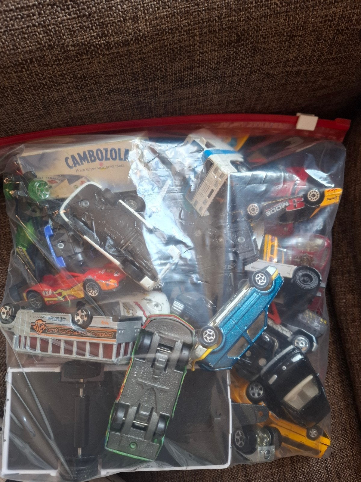 Zak met speelgoedautos, Ophalen, Gebruikt