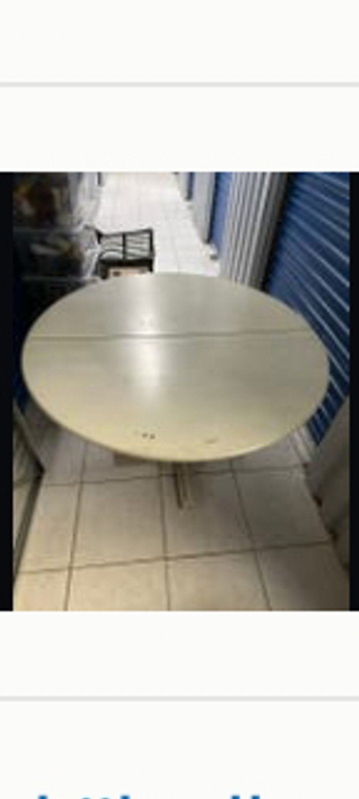 Witte ronde uitschuifbare tafel, Ophalen