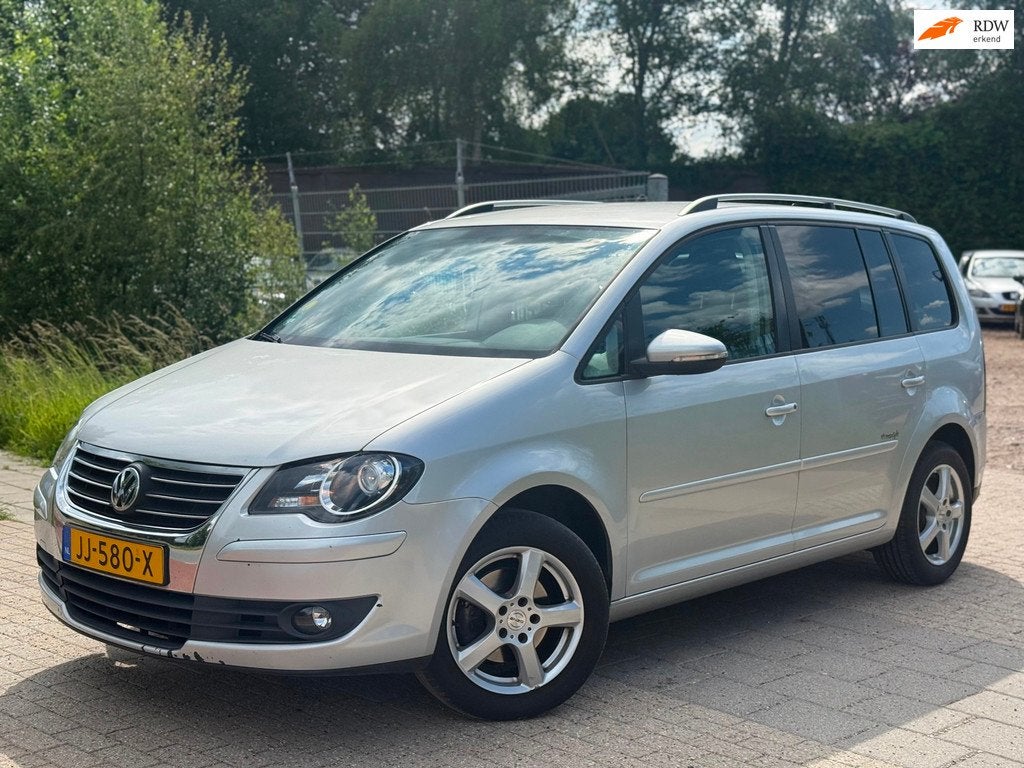 Volkswagen Touran 1.4 TSI Highline Automaat Airco Cruise Tre, Gebruikt, 4 cilinders, 14 km/l, Automatische klimaatregeling