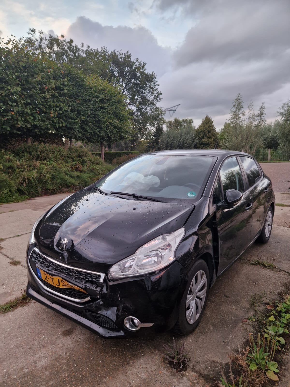 Peugeot 208 1.2 VTI 60KW/82PK 5-D 2014 Zwart, Voorwielaandrijving, 31 €/maand, 1199 cc, Zwart
