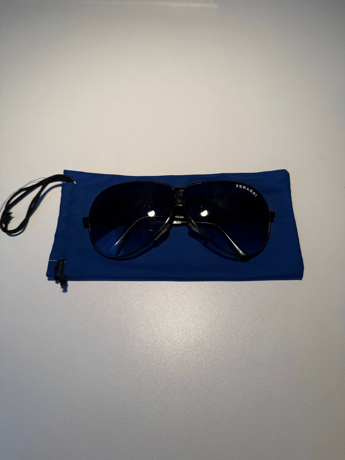 Zonnebril Ferarri met blauw etui, Overige merken, Gebruikt, Zonnebril, Verzenden