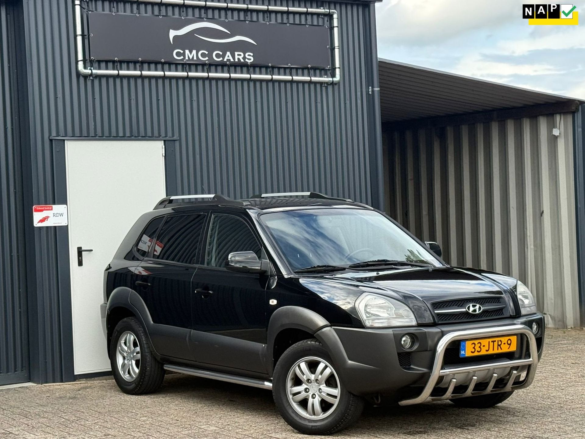 Hyundai Tucson 2.0i Style Cross RIJDTPERFECT!DRIEM VV!NW APK, Auto's, 4 cilinders, Zwart, Origineel Nederlands, Handgeschakeld