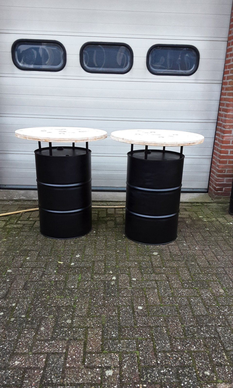 statafels van een olievat, Ophalen