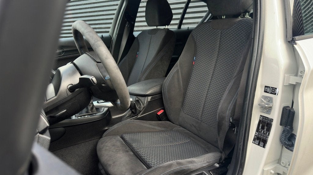 BMW 1-serie 116i Executive M-Sport | Xenon | Alcantara | Sto, Auto's, BMW, 1-Serie, Euro 5, Gebruikt, Zwart