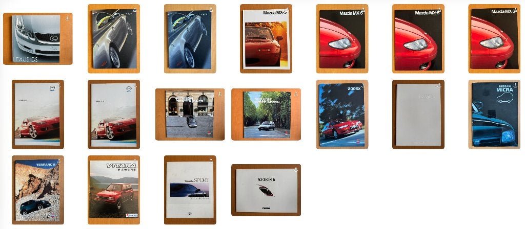 18 folders Japanse merken, Ophalen of Verzenden, Gelezen, Overige merken