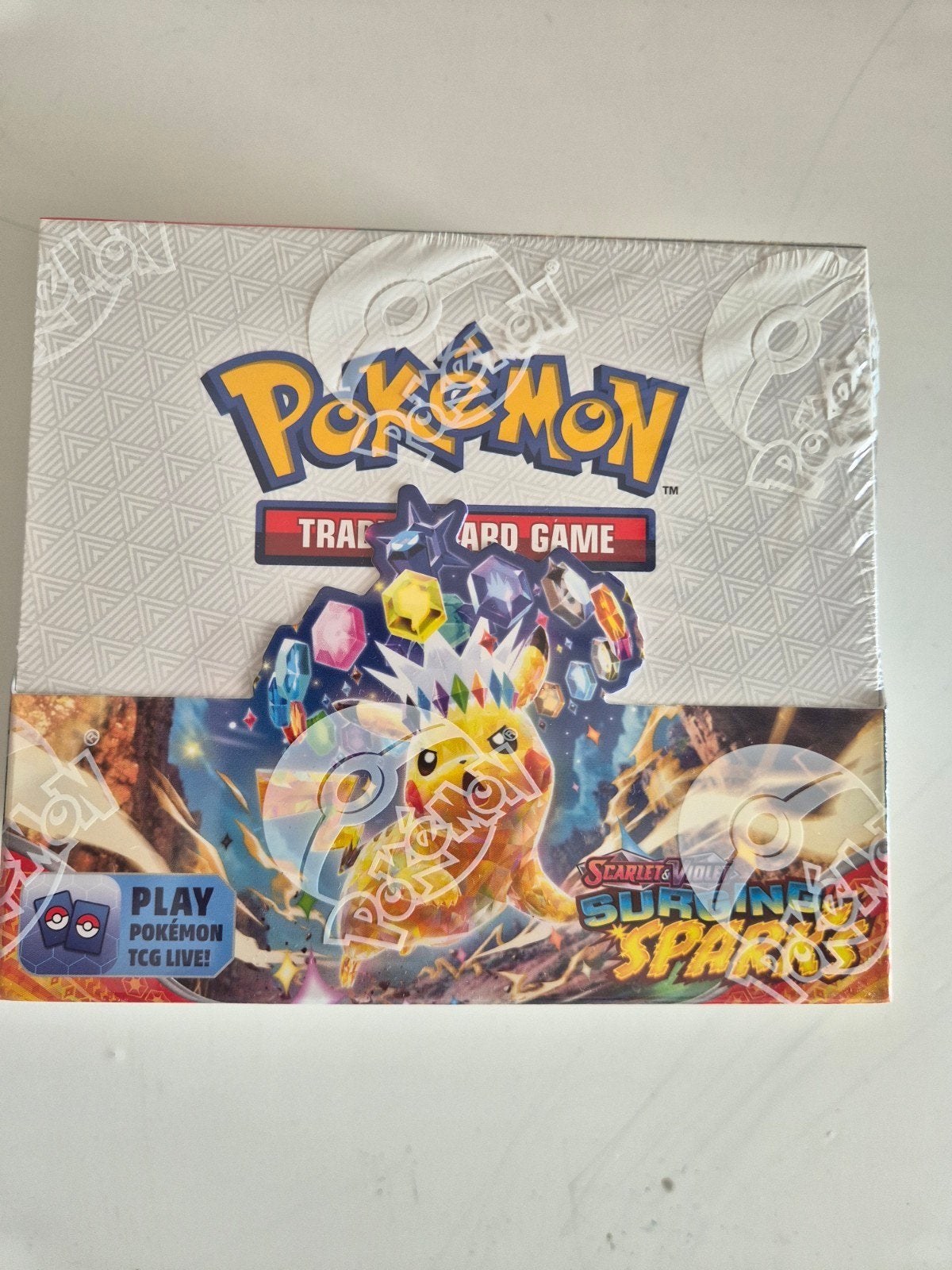 Pokémon TCG: Scarlet & Violet - Surging Sparks Booster Box, Hobby en Vrije tijd, Verzamelkaartspellen | Pokémon, Verzenden, Nieuw