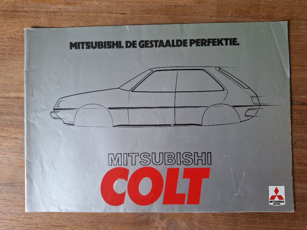 Mitsubishi Colt brochure folder 1979, Boeken, Ophalen of Verzenden, Gelezen, Mitsubishi