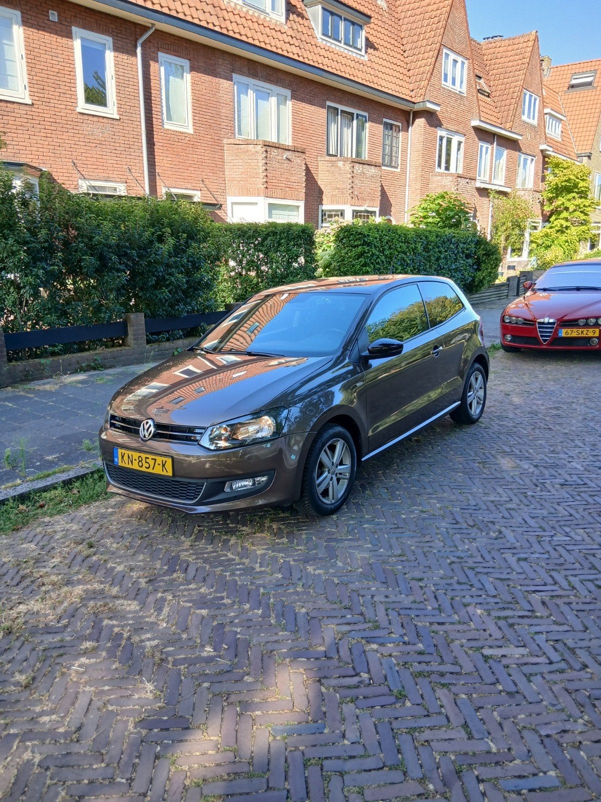Volkswagen Polo 1.2 TSI DSG, Auto's, 40 €/maand, 4 cilinders, Bruin, Leder en Stof