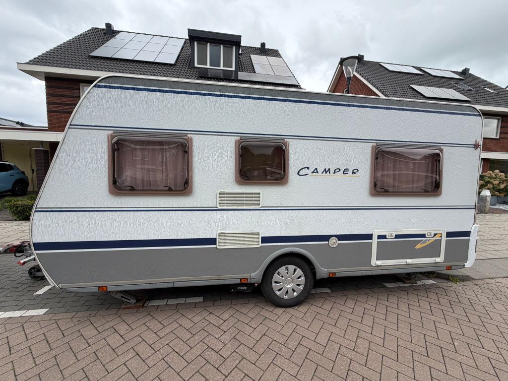 Dethleffs 450DB(2006) Zeer nette caravan + mover & voortent, Rondzit, 750 - 1000 kg, Particulier, Vast bed