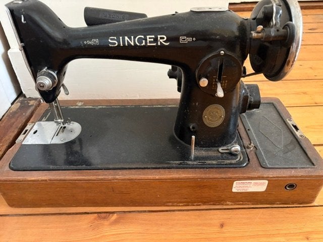 Vintage Singer naaimachine, Ophalen