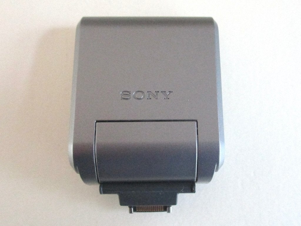Sony flitser HVL-F7S voor Nex-serie, Ophalen of Verzenden, Zo goed als nieuw, Overige merken