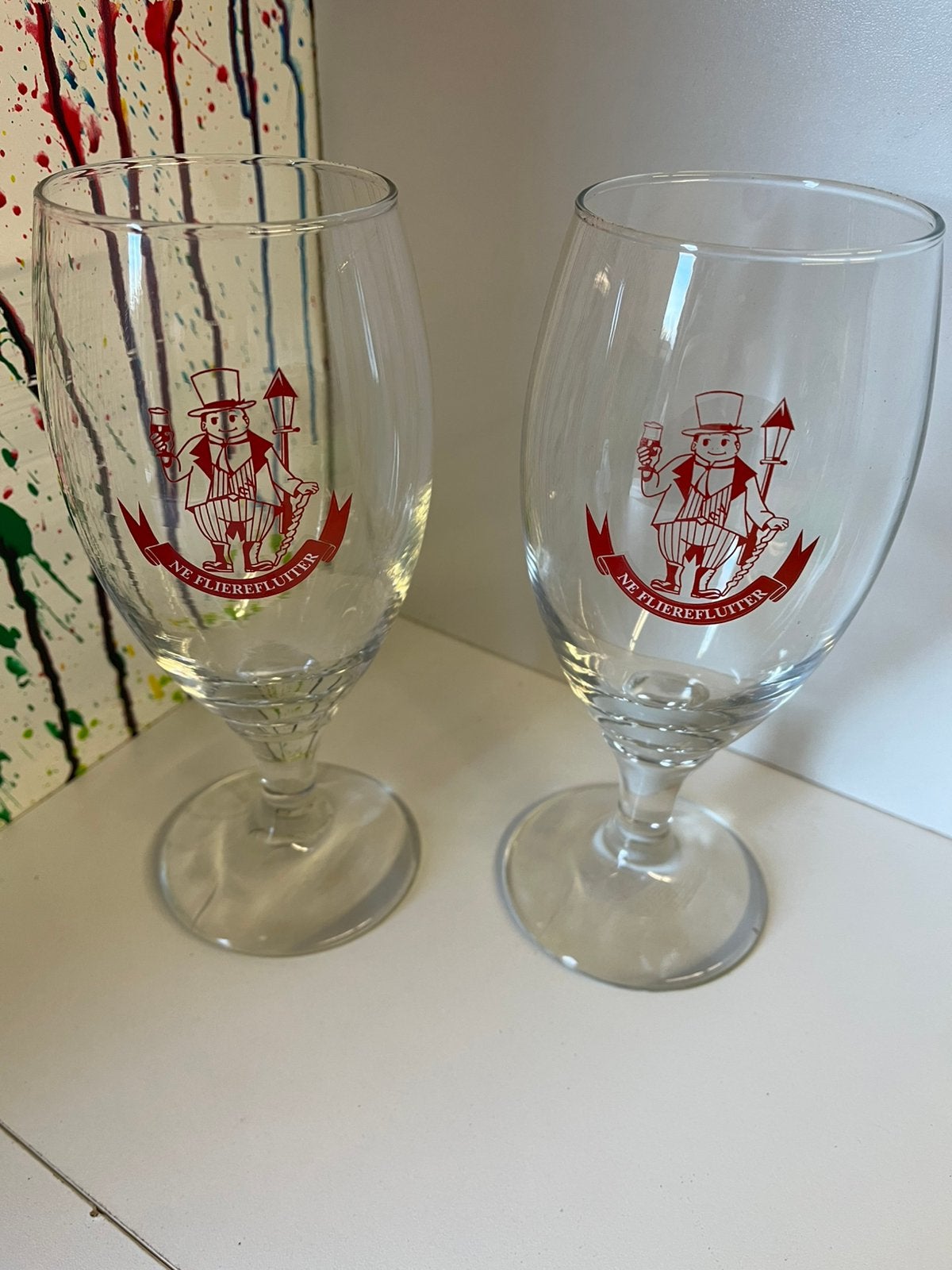 Ne Flierefluiter bierglazen set van 2 glazen, Verzamelen, Ophalen of Verzenden, Nieuw, Glas of Glazen, Overige merken