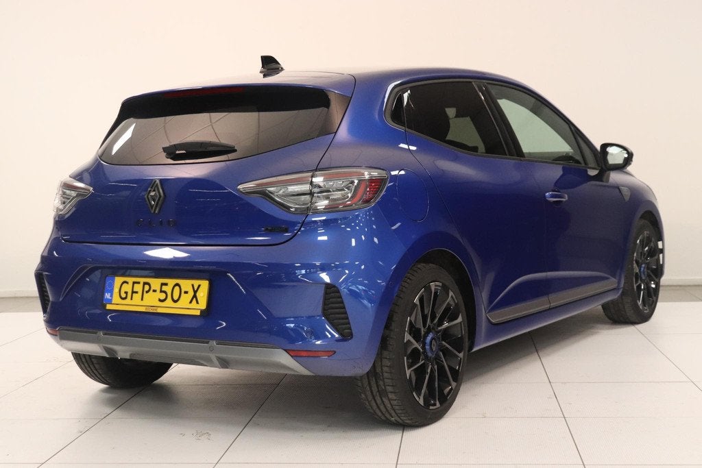 Renault Clio 1.6 E-Tech Full Hybrid 145 esprit Alpine | 360, Auto's, Gebruikt, Met garantie (alle), Blauw, Leder en Stof