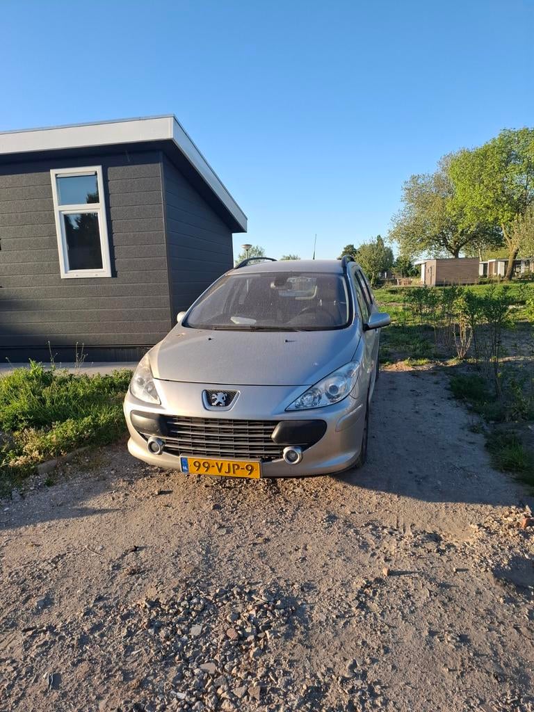 Bedrijfswagen Peugeot 307 1.6 Hdif 16V 66KW Commercial 2007, Auto's, Voorwielaandrijving, Zwart, 4 cilinders, Leder en Stof