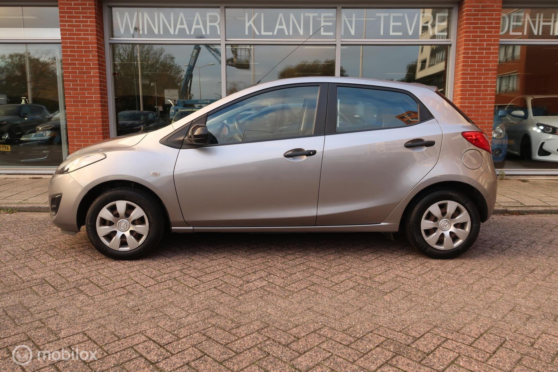 Mazda 2 1.3 BIFUEL Cool Airco Cruise cont, Auto's, Gebruikt, 31 €/maand, 4 cilinders, 4 stoelen