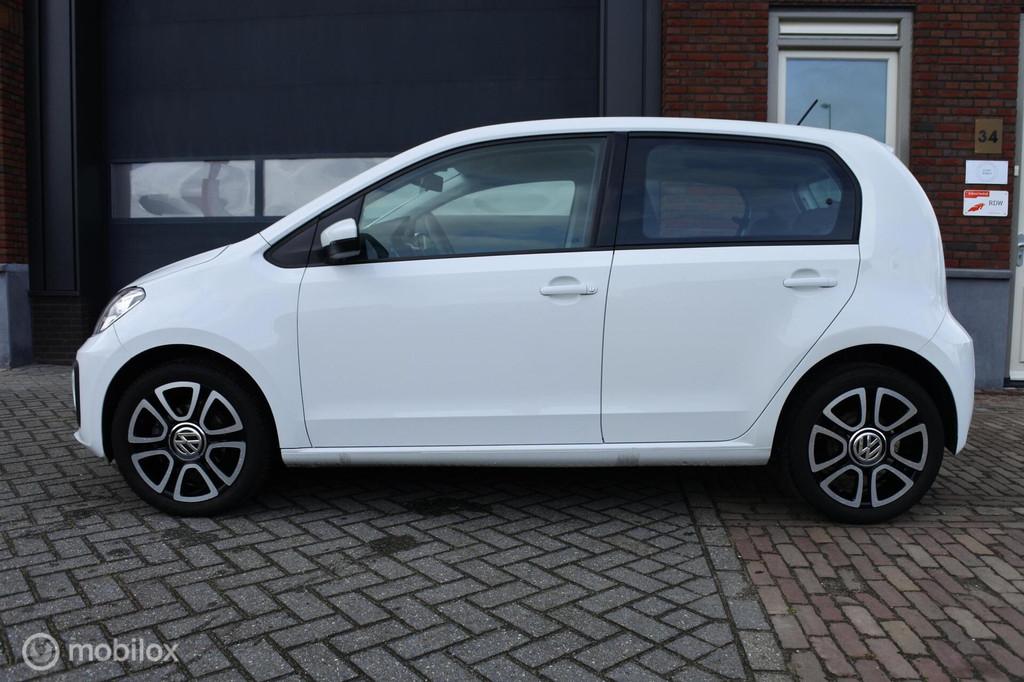 Volkswagen Up! I 1.0 I Airco I Stoelverwarming! I Bluetooth, Auto's, Stof, Gebruikt, Met garantie (alle), 4 stoelen