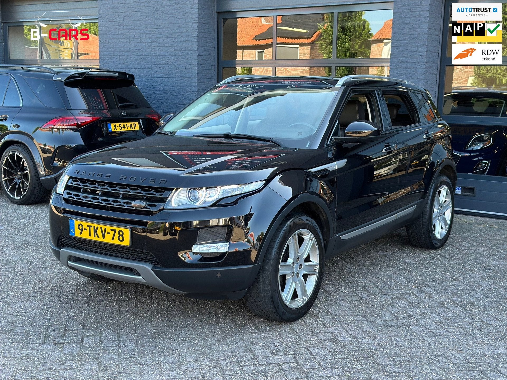 Land Rover Range Rover Evoque 2.0 Si 4WD Prestige Xenon|Leer, Auto's, Euro 5, 4 cilinders, Zwart, Bedrijf