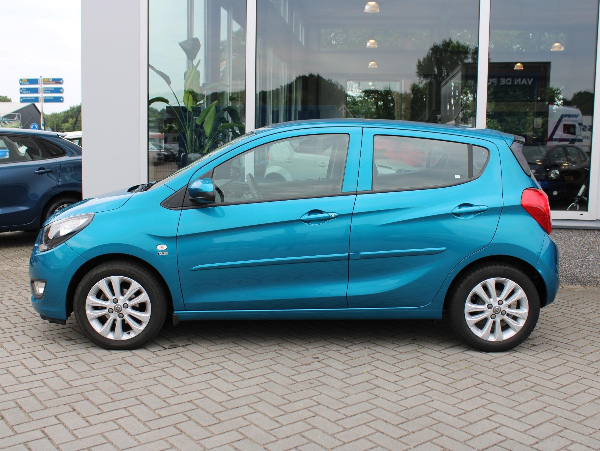 Opel KARL 1.0 ecoFLEX 120 Jaar Edition Airconditioning, Lich, Auto's, Stof, Gebruikt, Blauw, Origineel Nederlands