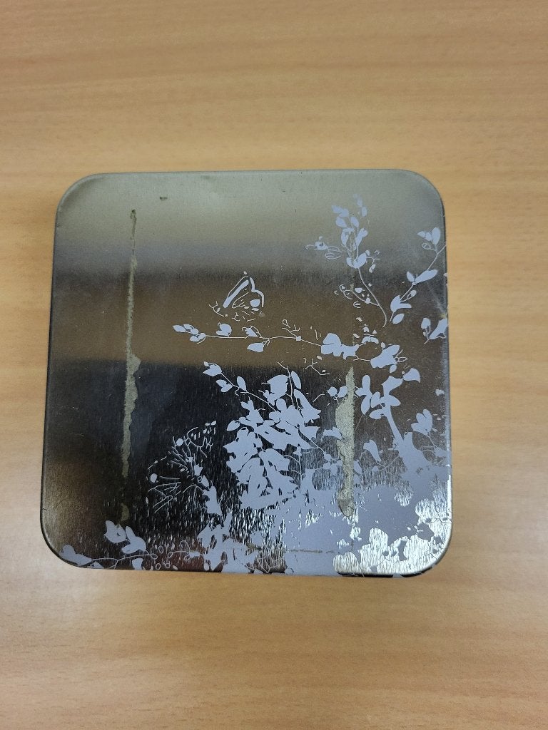 Blik zilverkleurig.          Met ook witte opdruk takjes., Ophalen of Verzenden, Nieuw, Overige