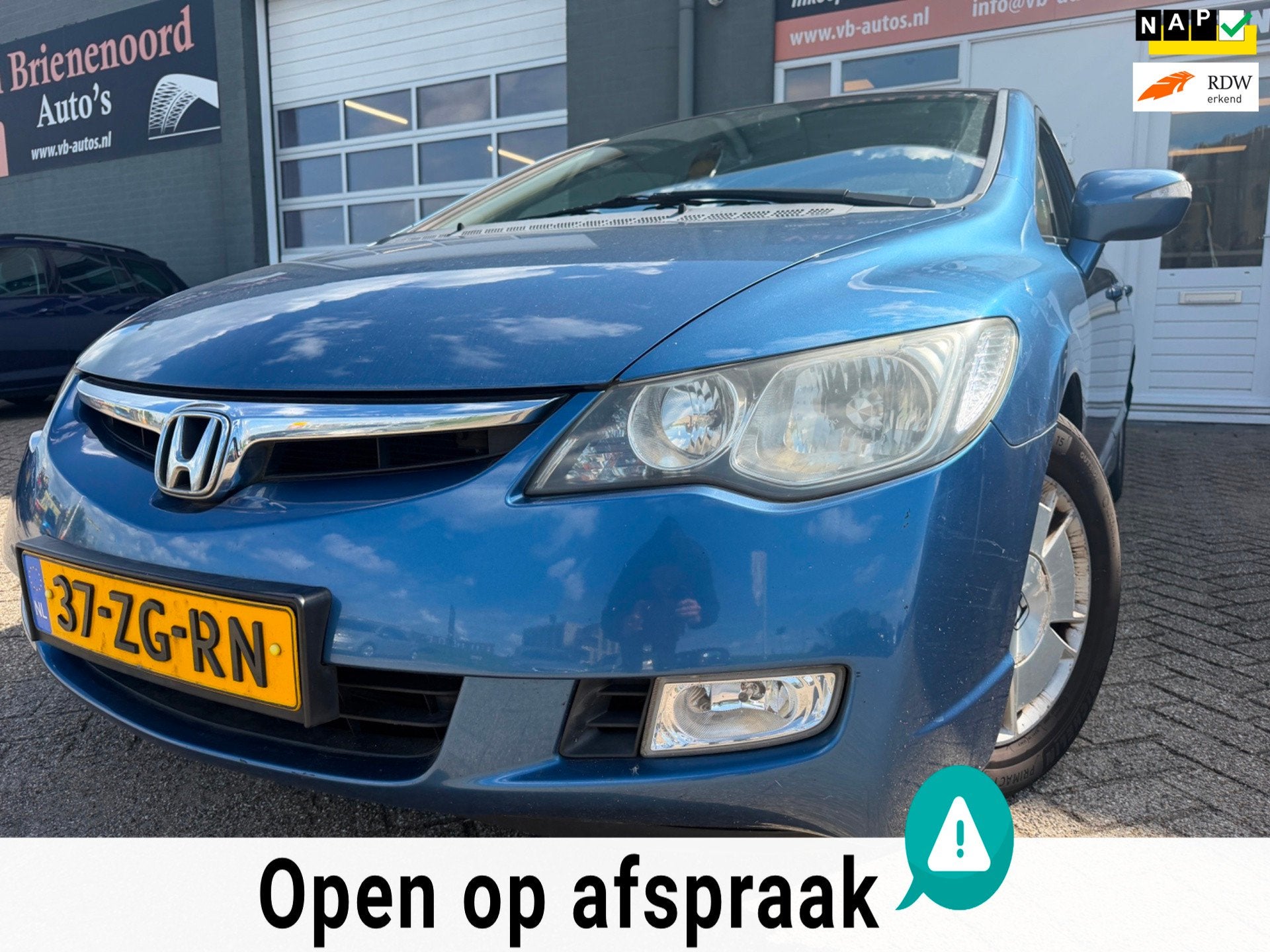 Honda Civic 1.3 Hybrid Comfort in automaat met cruise contro, Auto's, Stof, Gebruikt, Zwart, Blauw