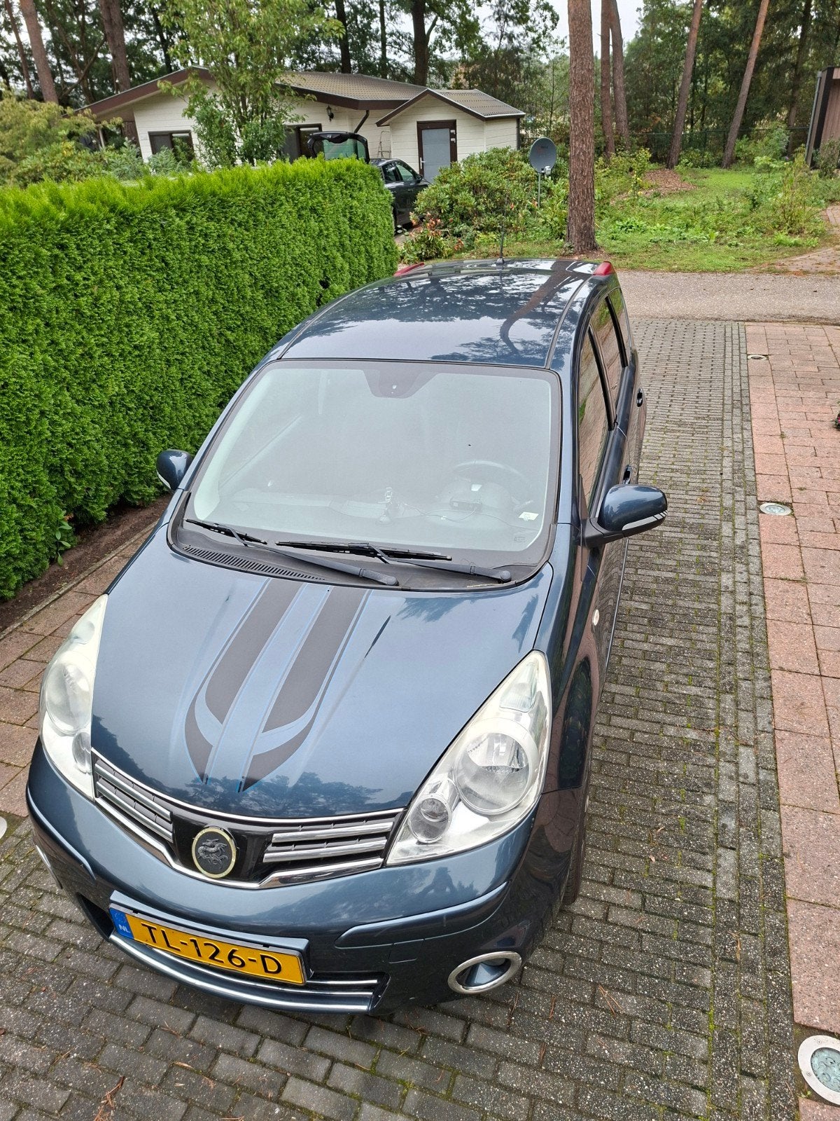 Foto 6 van nissan note 1.4 groen perfect onderhouden.