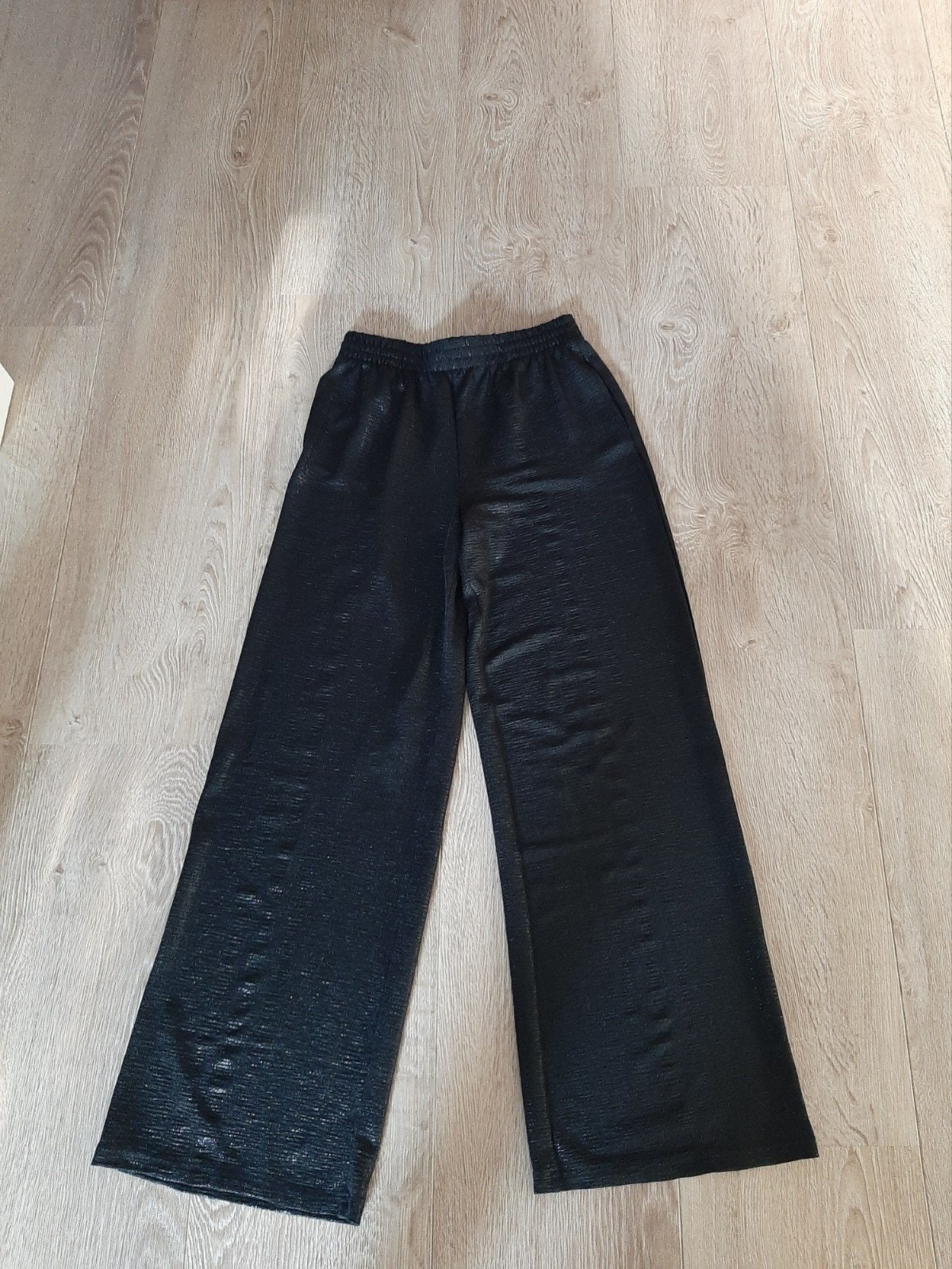 Zwart Shoeby glitter flared broek maat XS, Zwart, Ophalen of Verzenden, Zo goed als nieuw, Shoeby