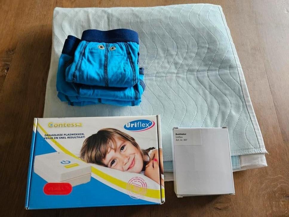 Uriflex Contessa plaswekker + trilalarm, broekjes & hoes, Ophalen of Verzenden