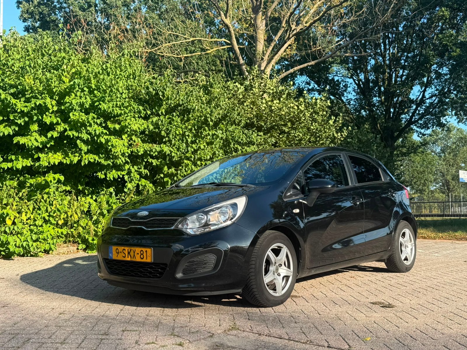 Kia Rio 1.2 I 5DRS 2013 Zwart, Auto's, 1027 kg, 450 kg, 40 €/maand, 4 cilinders