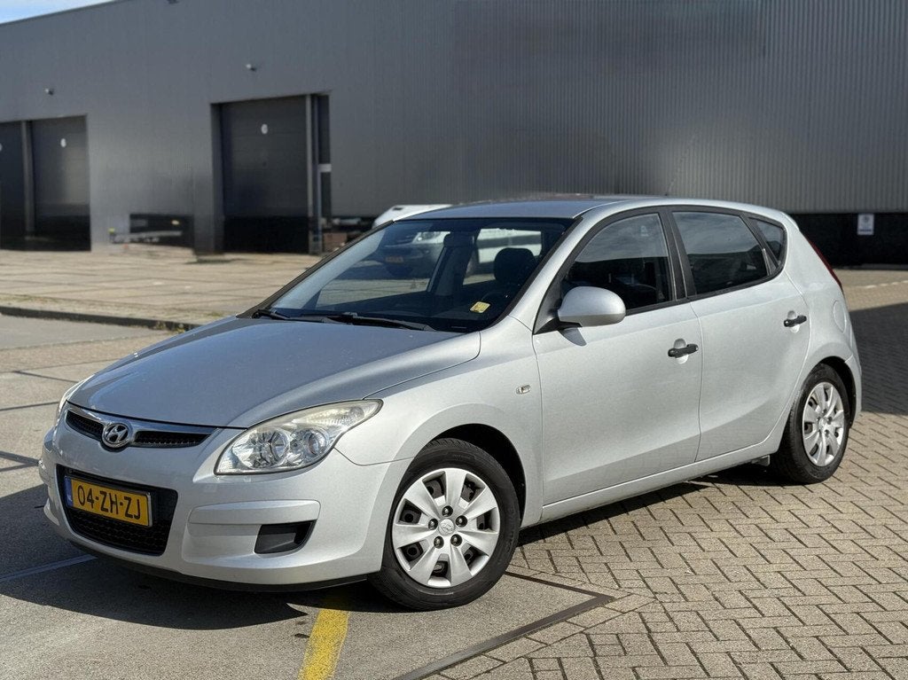 Hyundai i30 1.4i Active Cool Airco Aux Elekpakket NL Auto, Auto's, Hyundai, Voorwielaandrijving, Gebruikt, 4 cilinders, 1396 cc