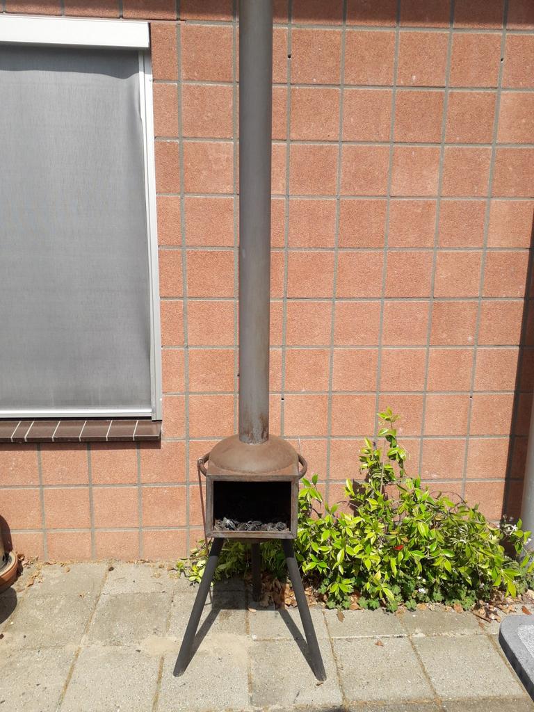 Tuinhaard gemaakt van gasfles op pootjes, Ophalen