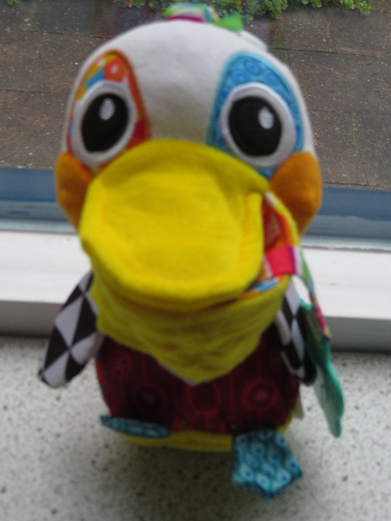 Pelikaan Philip merk Tomy Lamaze met ophangclip, Ophalen of Verzenden, Zo goed als nieuw, Overige typen, Met geluid