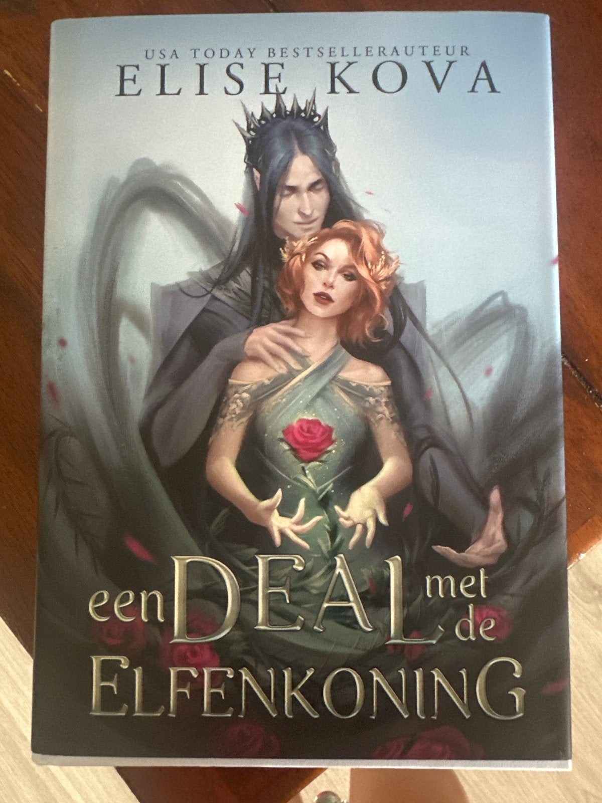 Een Deal met de Elfenkoning - Elise Kova (Hardcover), Ophalen of Verzenden, Zo goed als nieuw