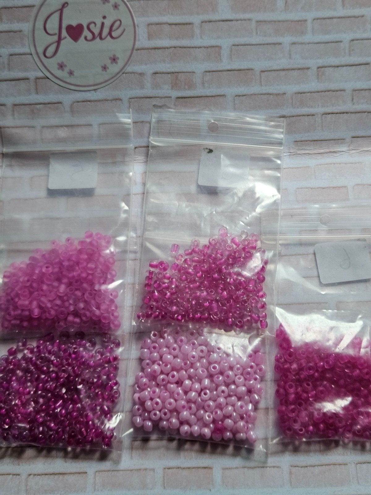 5 zakjes roze rocailles, Ophalen of Verzenden, Nieuw, Kraal